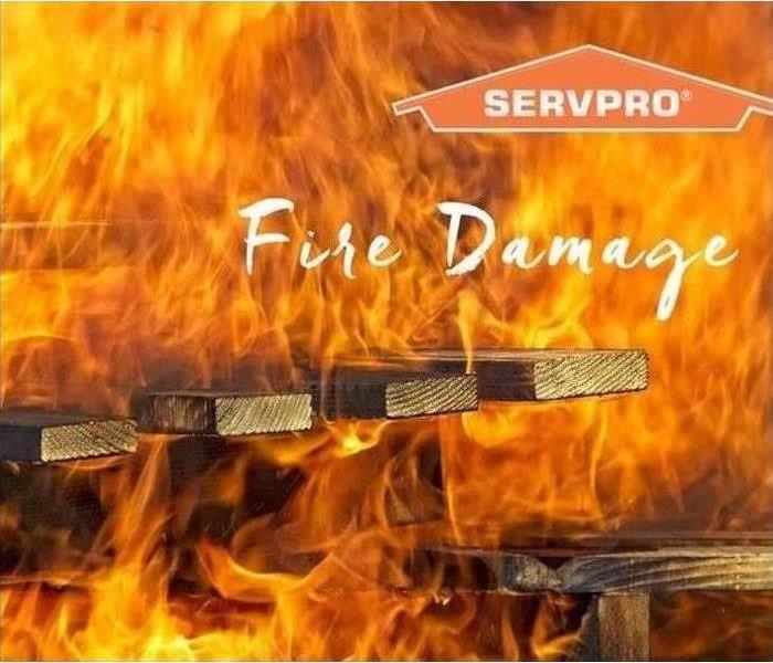 Flames engulfing wooden plankes. "fire damage" and orange servpro logo in top right corner